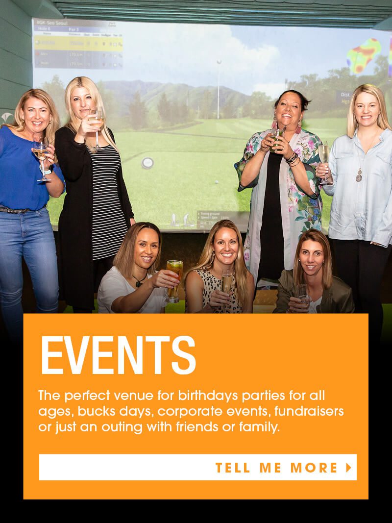 Ladies drink wine infront of X-golf simulator