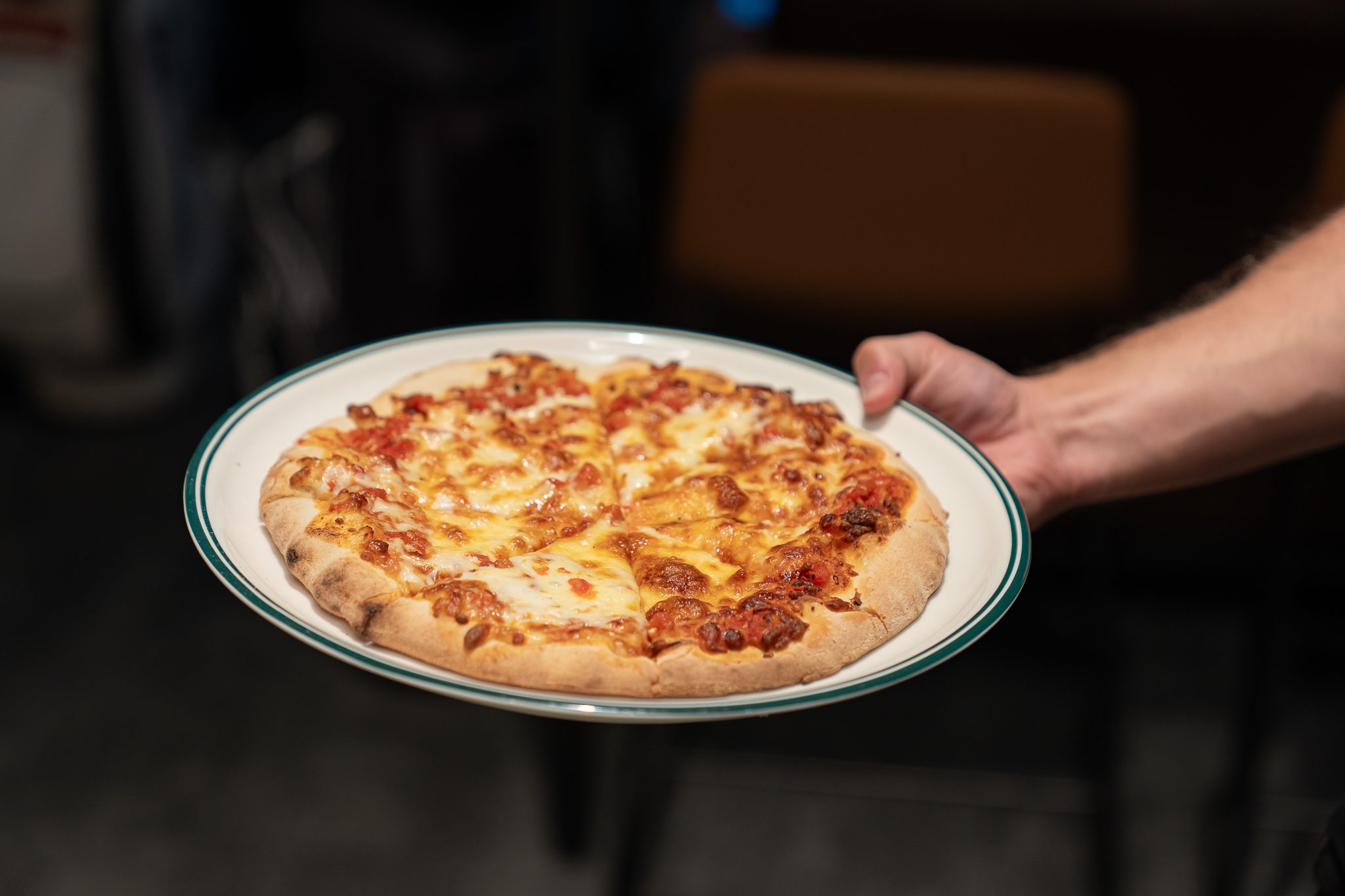 Fresh pizza served hot at X-Golf Morley venue